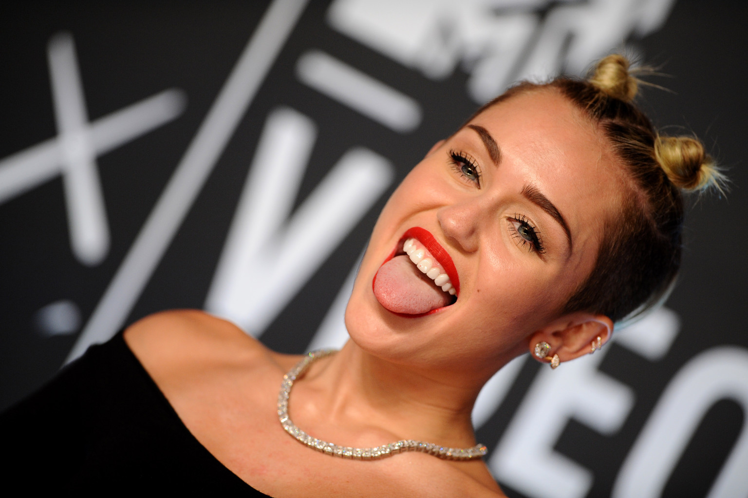 Miley Cyrus Posts Picture Of Herself With Two Reefers At Once, Behind The Scenes Of 'Wrecking
