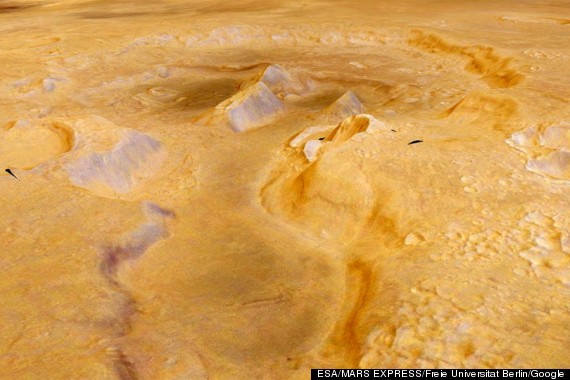 Supervolcanes en antiguas Marte pudo haber rasgado cráteres en la superficie del planeta rojo (VIDEO, FOTOS) O-MARS-SUPERVOLCANO-570