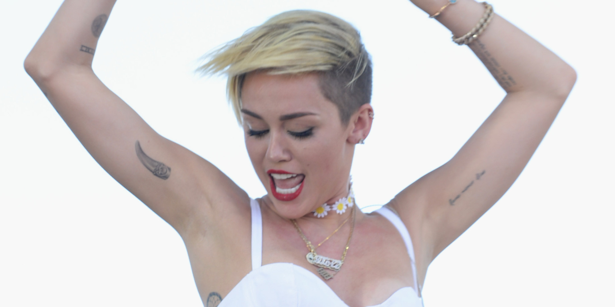 Miley Cyrus Tattoos & Meanings - A Complete Tat Guide