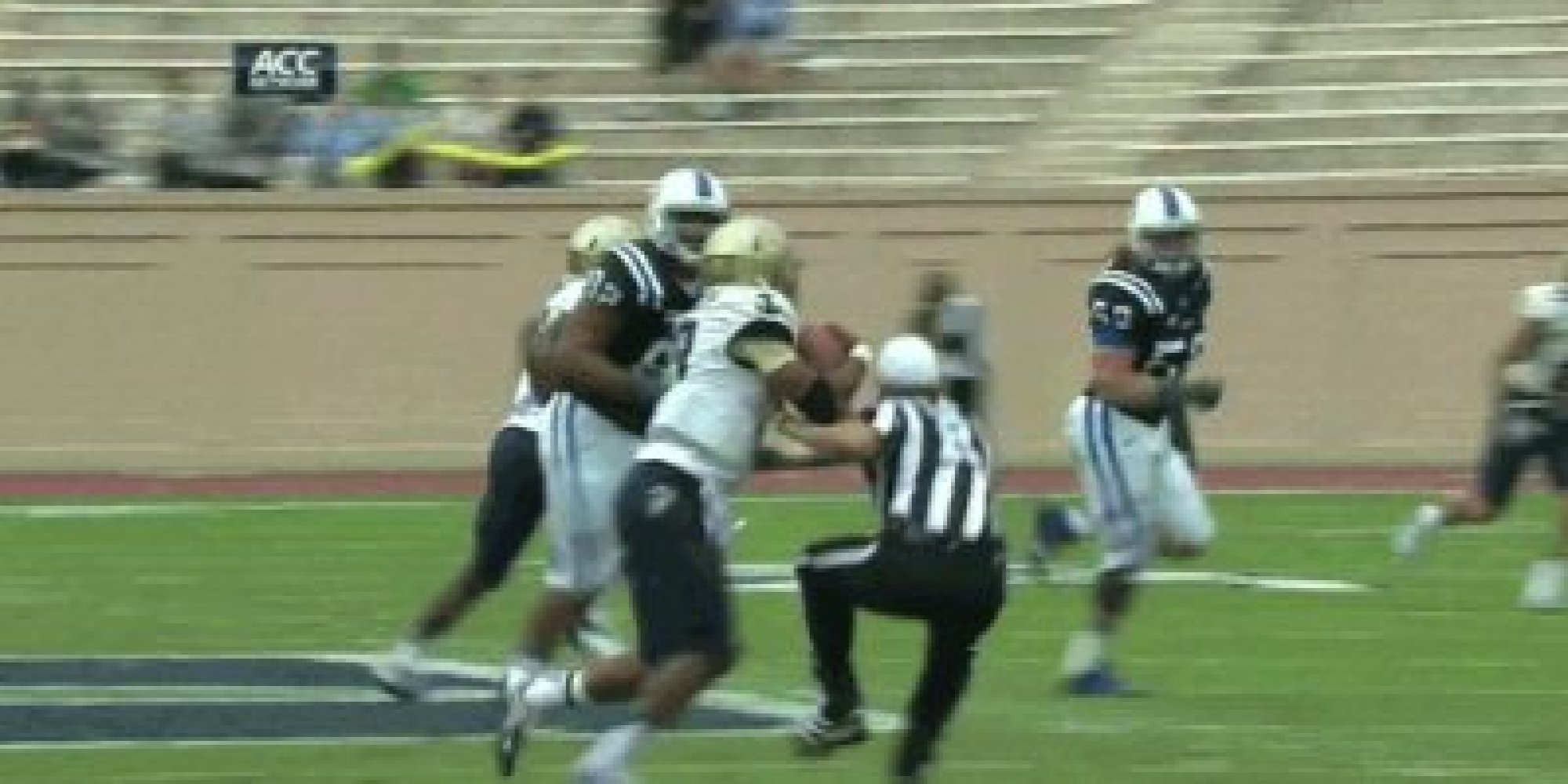 Keenan Reynolds Knocks Referee Down Navy QB Striff Arms Official (GIF