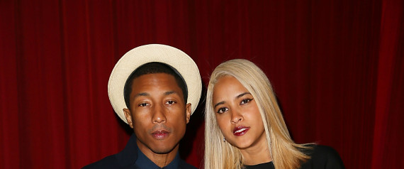 Essence - One of fashion's favorite couples, Pharrell Williams and wife,  Helen Lasichanh, attend the Yellow Ball in a pair of dapper suits