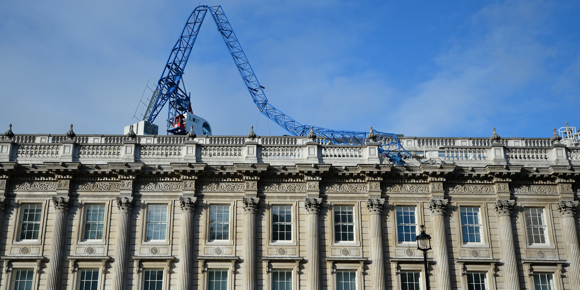 uk storm: crane collapses on cabinet office roof, nick clegg uk storm: crane collapses on cabinet office roof, nick clegg