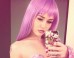 Miley Cyrus Dresses As Lil Kim
