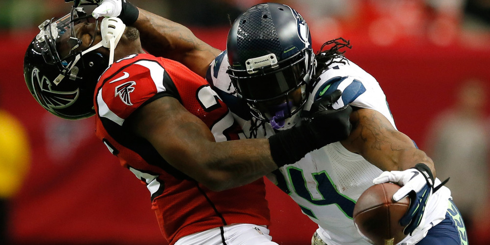 Seattle Seahawks linebacker Bobby Wagner (54) wraps up Denver Broncos wide  receiver Jordan Norwood (11) after he caught a five-yard pass during the  first quarter at CenturyLink Field on August 14, 2015