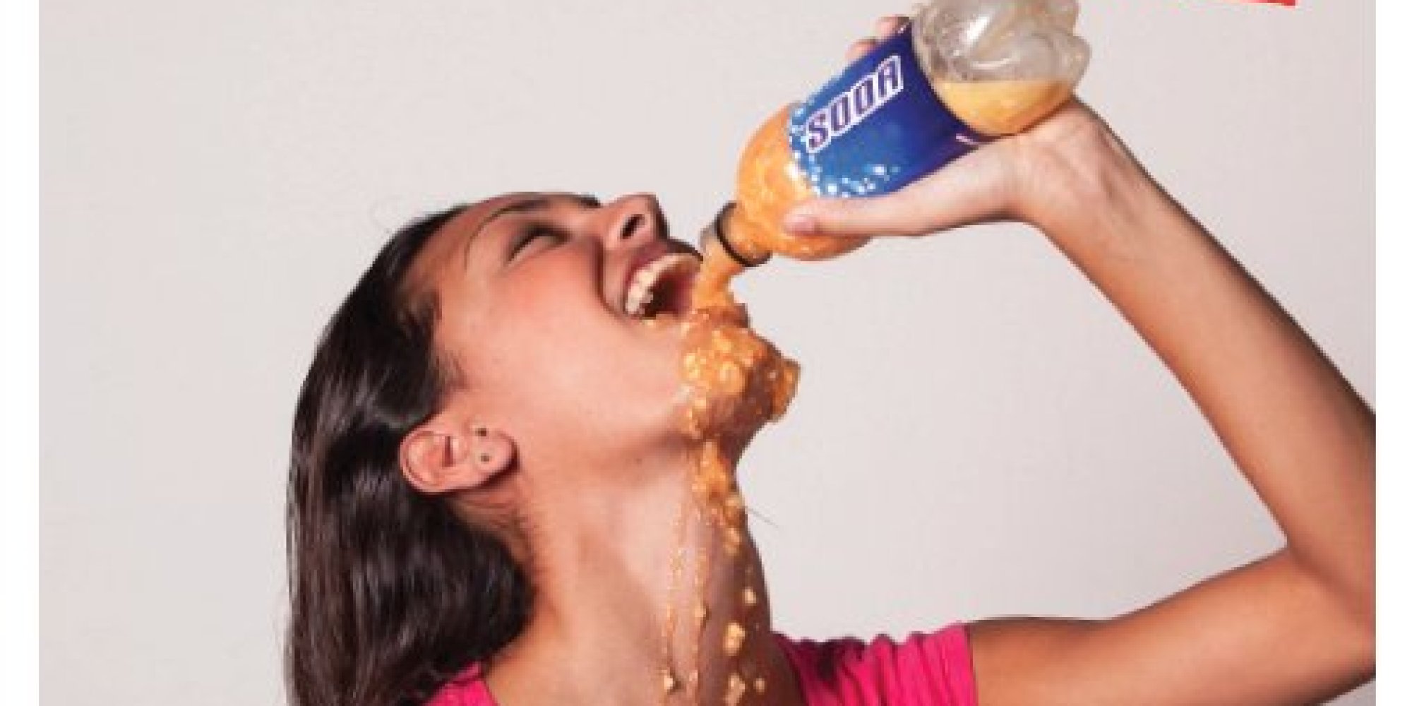 Pregnant woman drinking soft drink