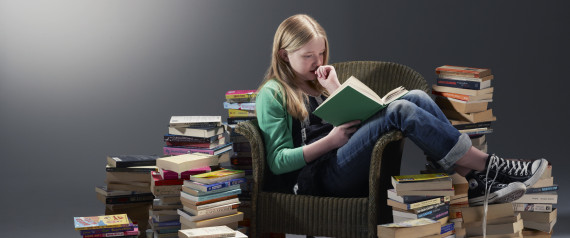 reading pile of books