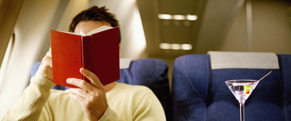 reading book airplane