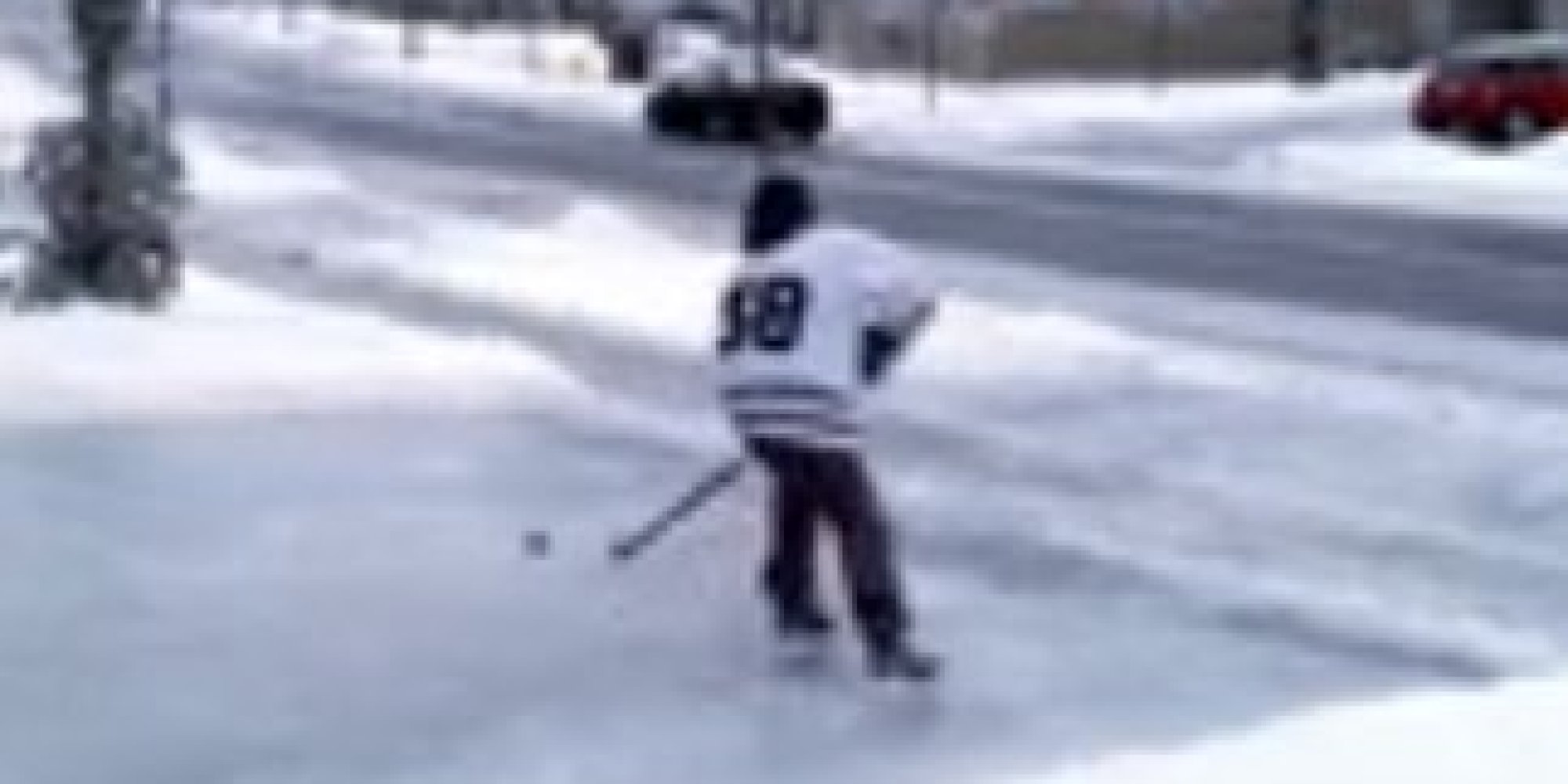 Man Plays Hockey On Frozen Driveway After GTA Ice Storm (VIDEO)