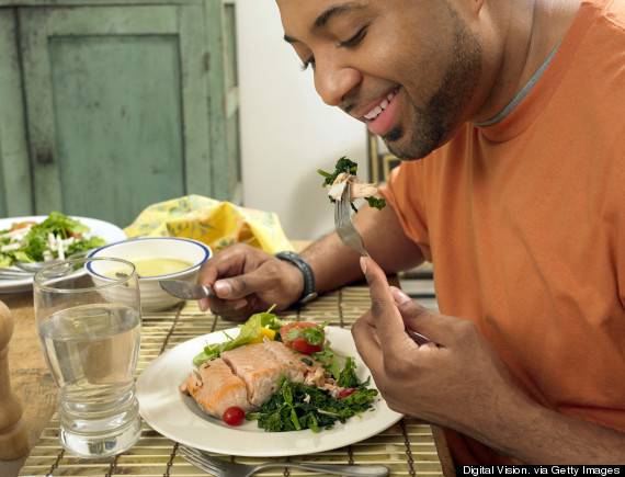 man eating salad