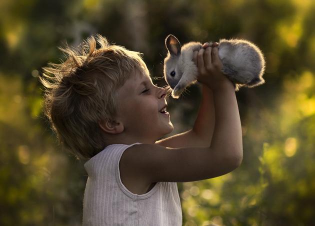 older boy with rabbit