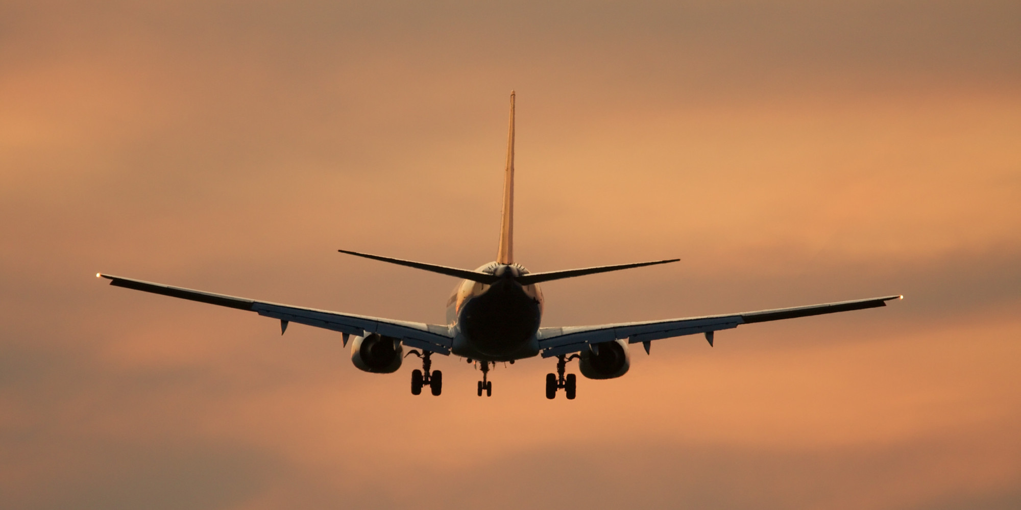 passenger-airplane-taking-off-at-sunset-high-res-stock-photo-getty-images