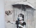 Banksy's 'Umbrella Girl' Rescued From Attempted Robbery