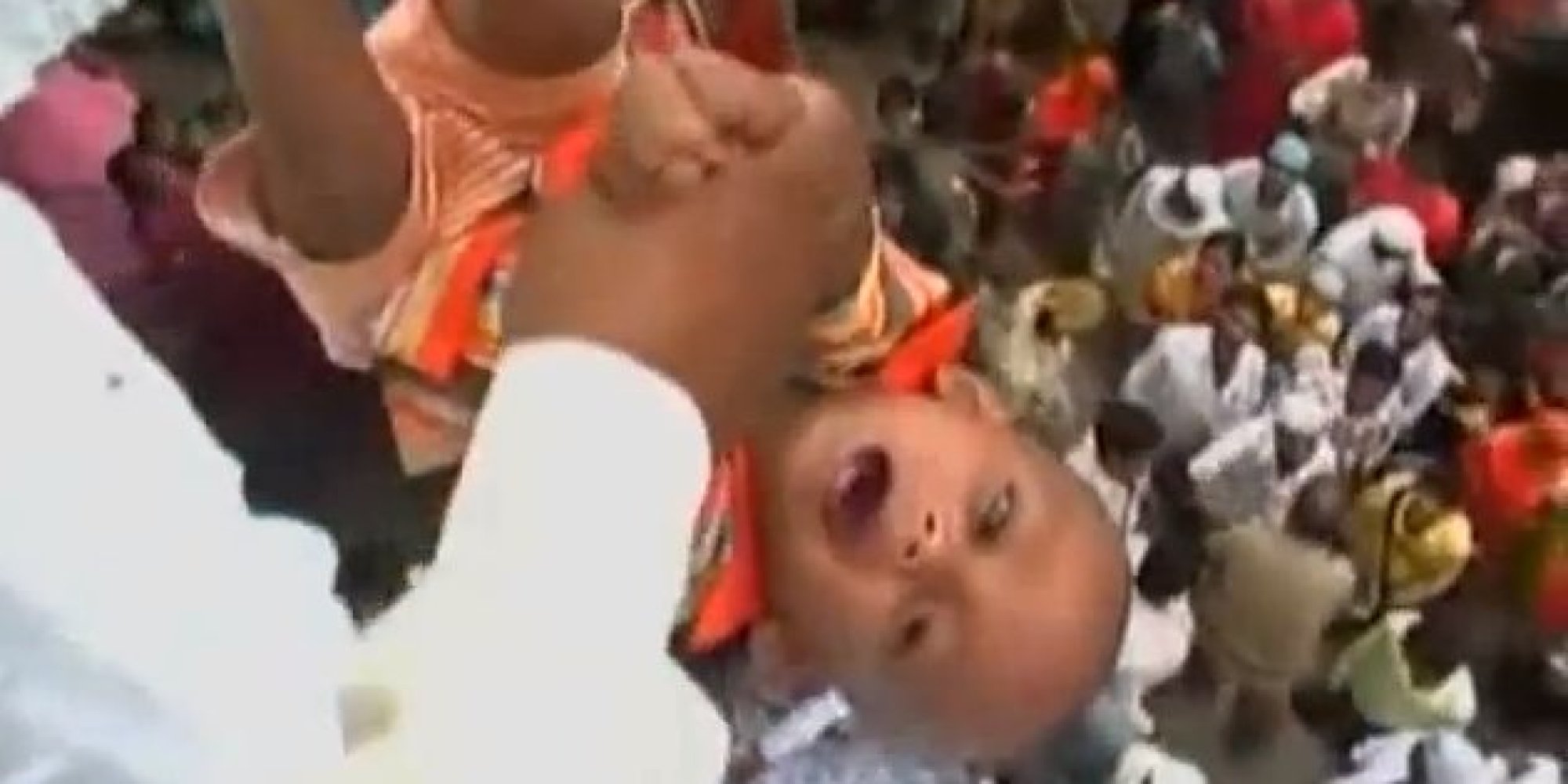 Indian BabyDropping Ritual At Baba Umer Durga, A Local Shrine, Is