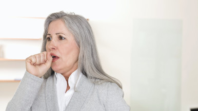 Woman coughing