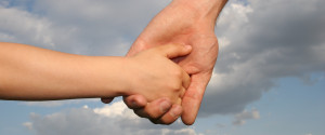 Father Holding Sons Hand
