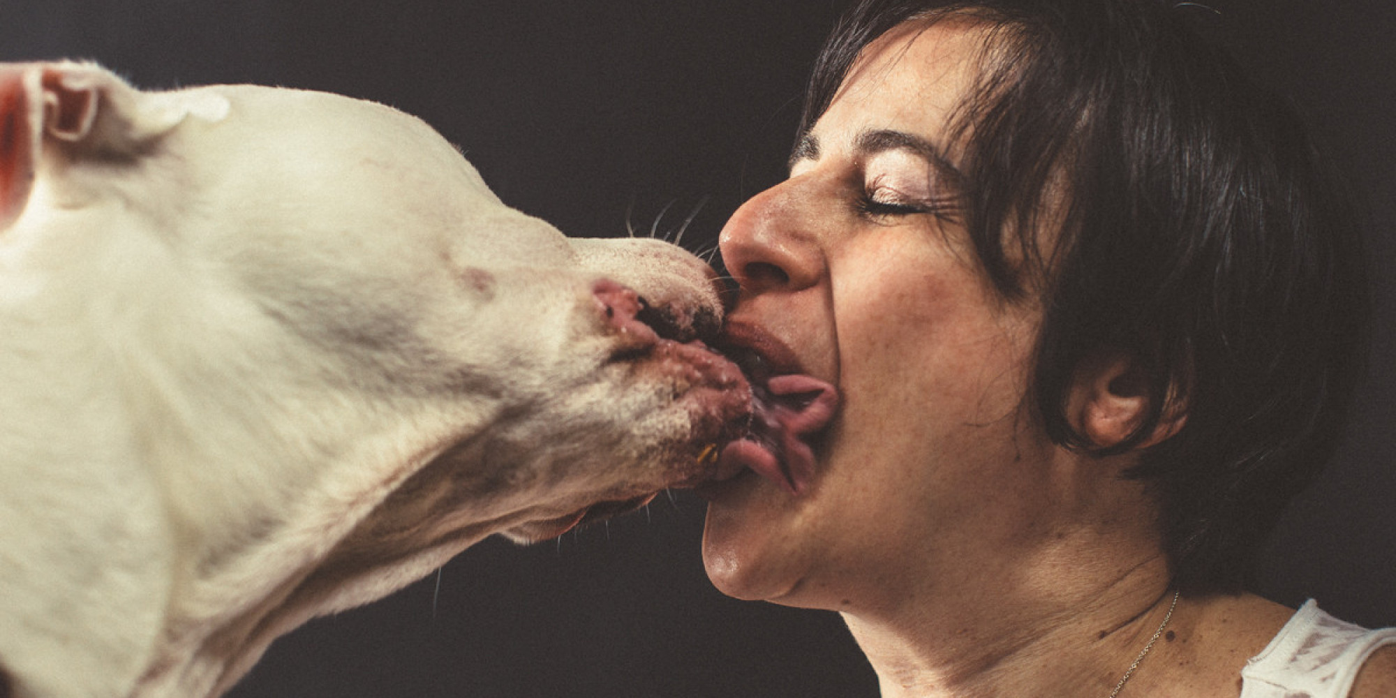 21 Gloriously Sloppy Kisses From Dog To Owner