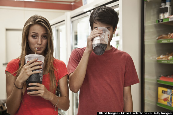teenagers drinking soda
