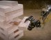 The Largest Jenga Game Played By Heavy Machinery Is Super Suspenseful (VIDEO)