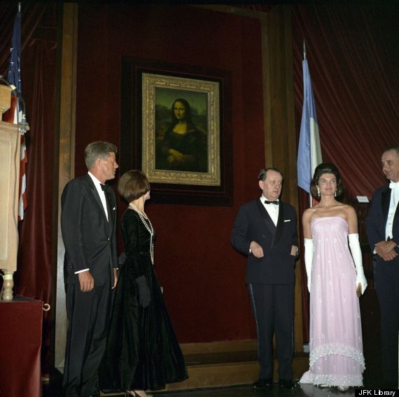 john and jacqueline kennedy attend the opening of