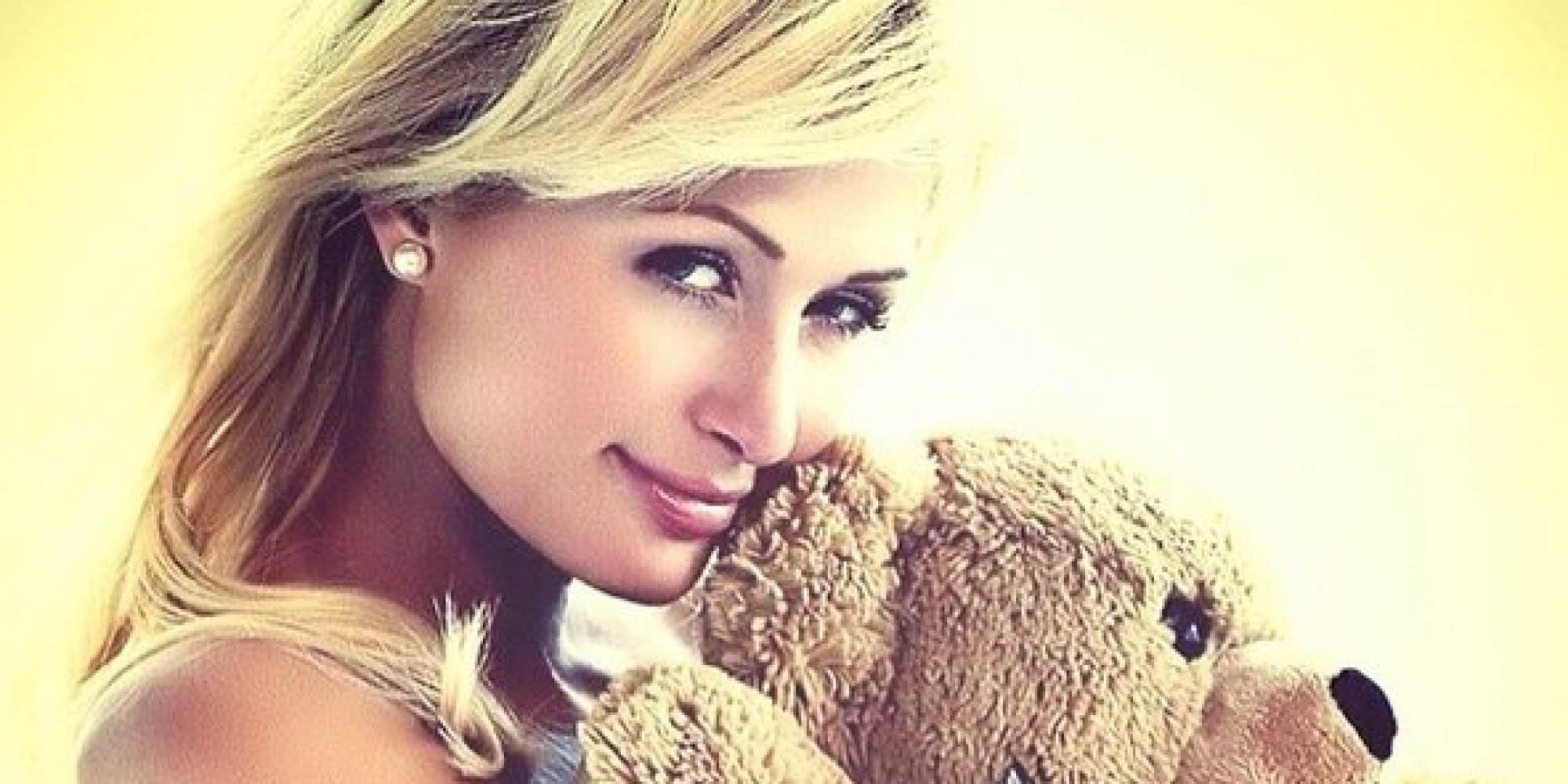 Paris Hilton Poses Topless While Hugging A Teddy Bear On Instagram