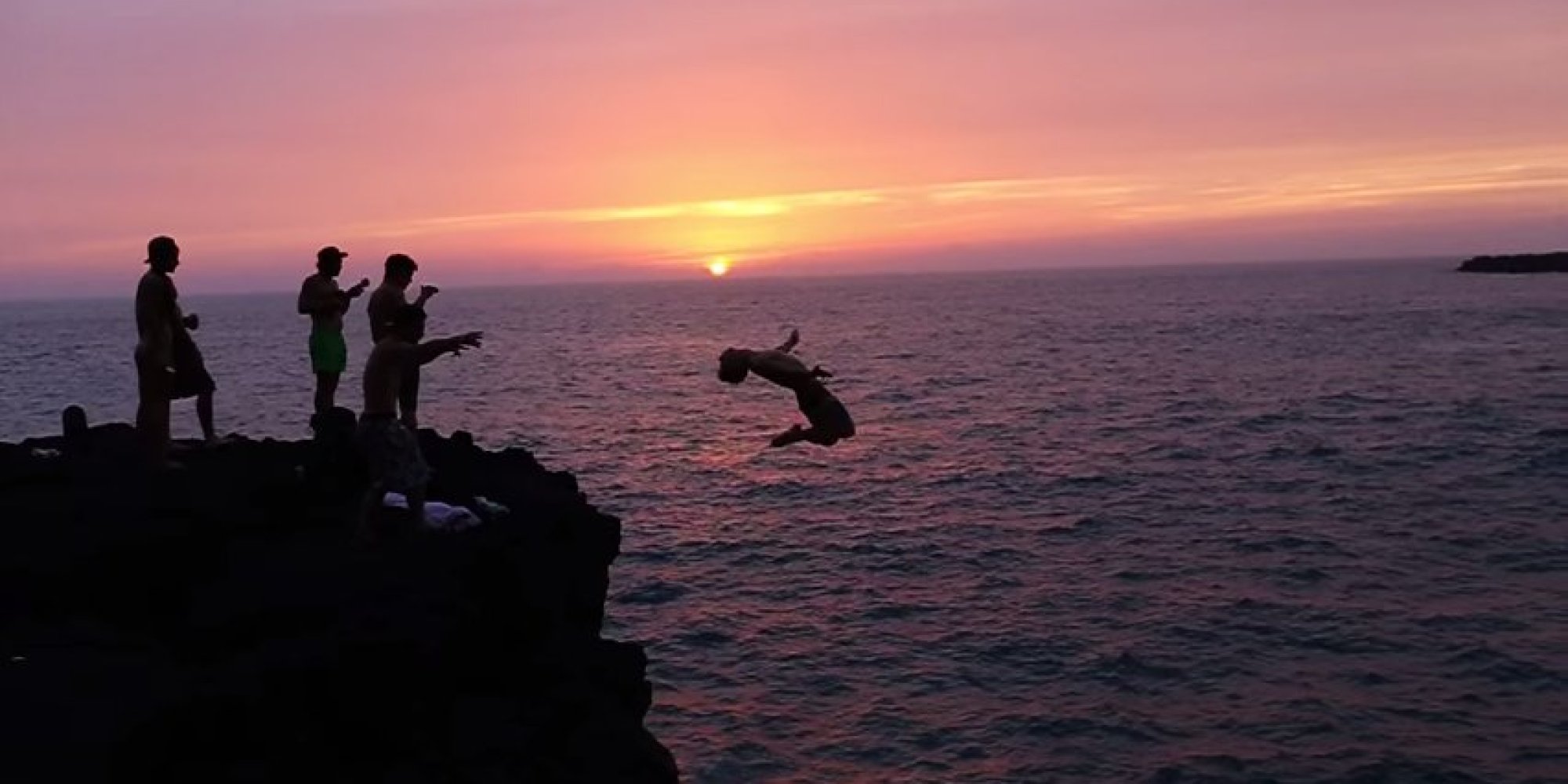 These Insane Cliff Divers Just Upped The Ante On Summer (VIDEO)