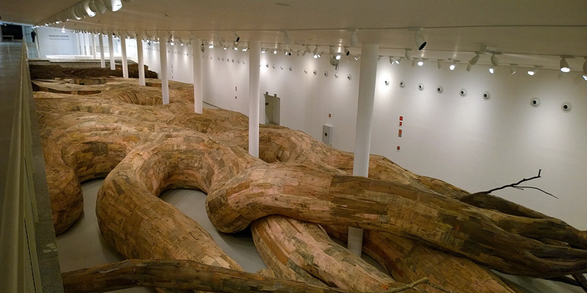 Artist Henrique Oliveira Constructs A Magnificent Wooden Universe In