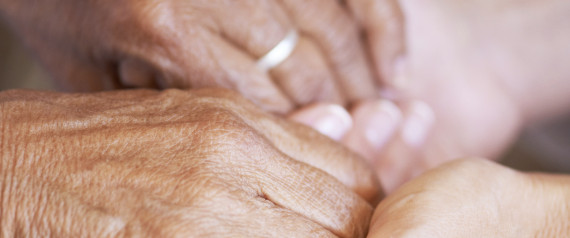 OLDER WOMAN COMFORTING