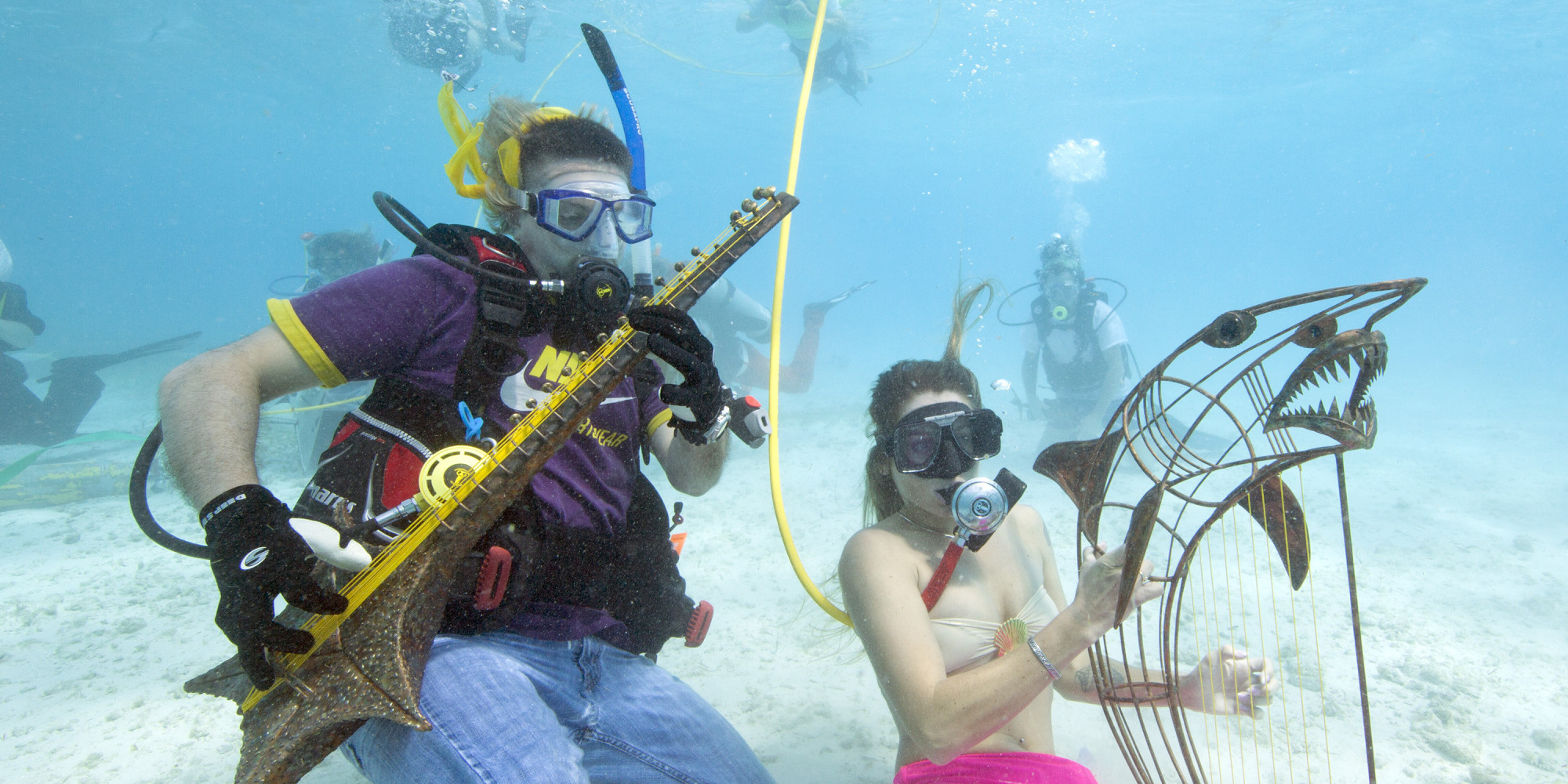 Lower Keys Underwater Music Festival Sees Divers Rock Out 'Under The Sea' (VIDEO)