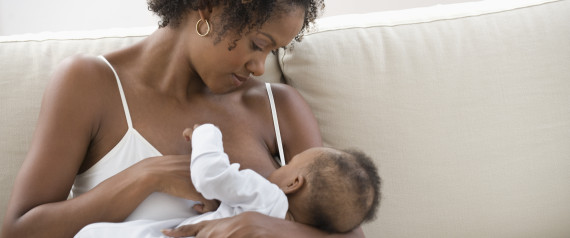 Woman breastfeeding. Image via the Huffington Post 