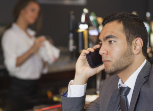 n-ON-PHONE-AT-BAR-large300.jpg