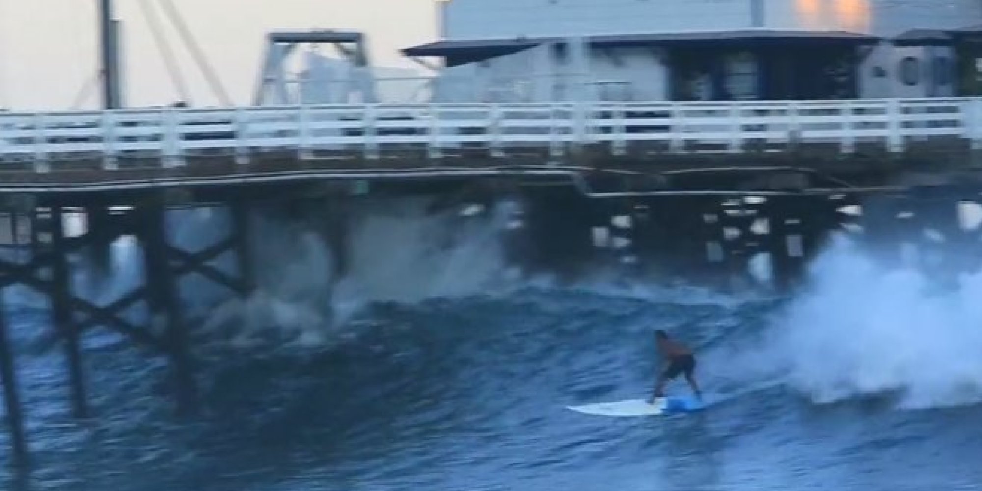 Laird Hamilton Slices Through Pier On Hurricane Waves, Then Rescues Man