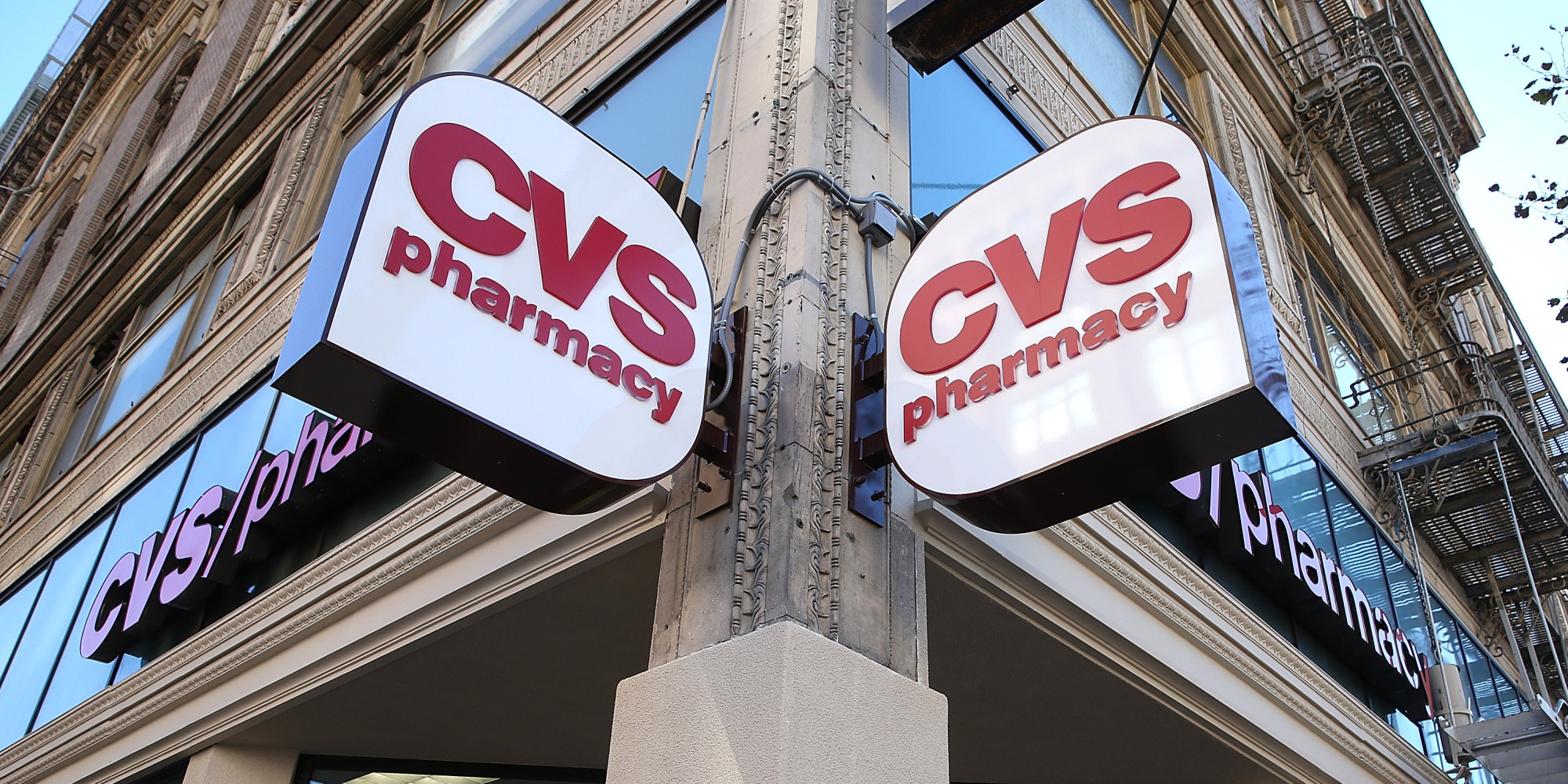 cvs to charge some customers more for using pharmacies
