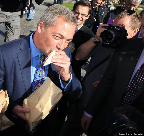 Nigel Farage Takes On Ed Miliband By Tucking Into Bacon Sandwich, Does Not Look Any Less Weird