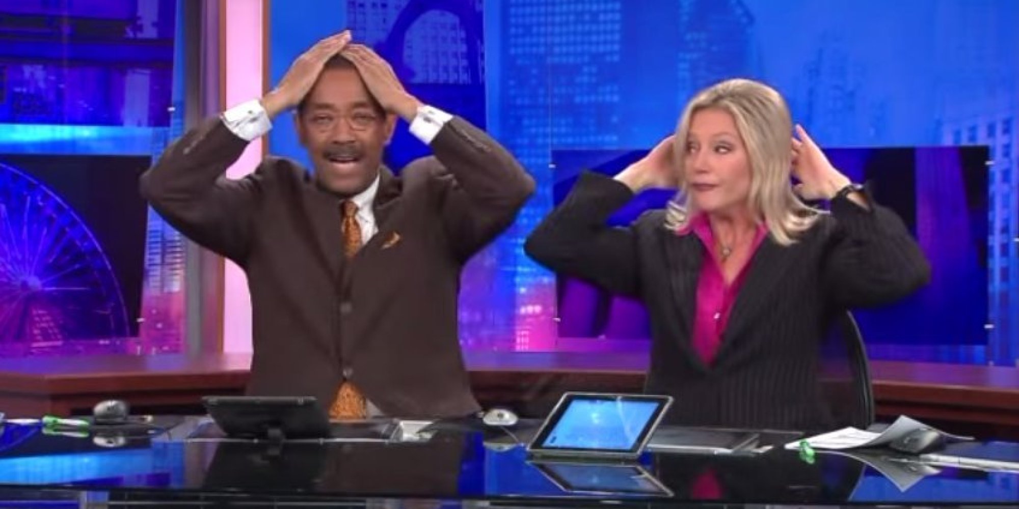 Two News Anchors Perform The Most Complicated Handshake