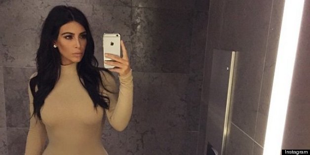 Kim Kardashian Snaps Bathroom Selfies During Date Night