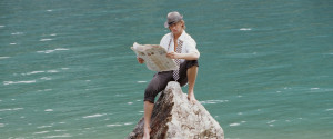 READING NEWSPAPER