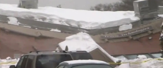 Snow Causes Roof Collapse At Commercial Building Video