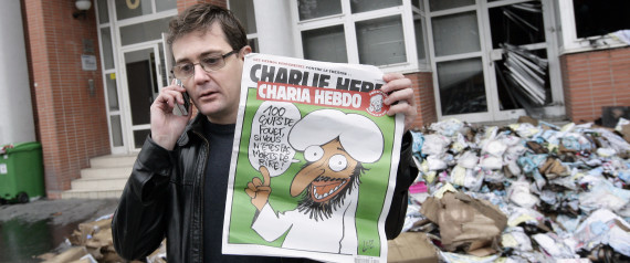 n-CHARLIE-HEBDO-CARICATURES-large570.jpg