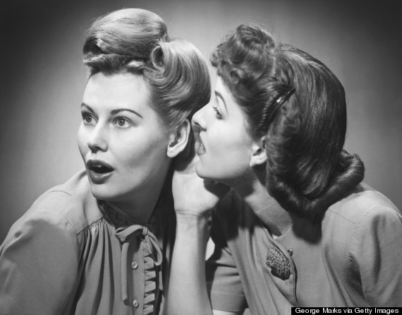 women whispering