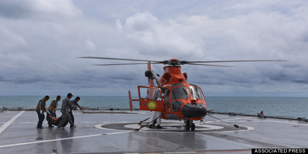 Indonesian Divers Retrieve More Bodies From AirAsia Crash