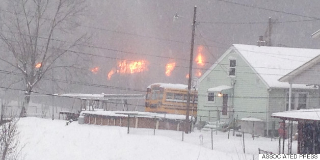 Oil Train Derailment Sends Crude Tanker Into River