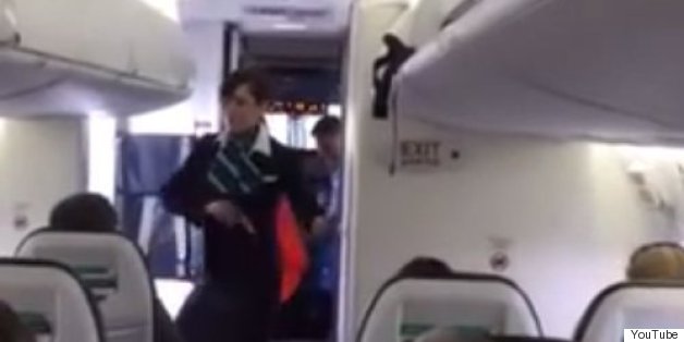 Flight Attendant Breaks Into 'Uptown Funk' Dance Before Takeoff