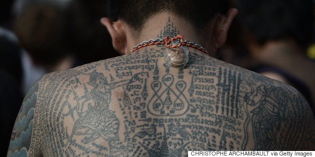 Thousands In Thailand Receive Magical Tattoos From Buddhist Monks