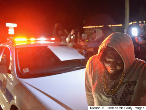 Ferguson Police Shooting 'Disgraceful And Cowardly,' Say Activists