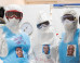 Artist Creates Quick Fix That Humanizes Ebola Aid Workers Inside Their Intimidating Suits
