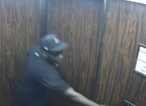 n-ROBBER-STUCK-IN-ELEVATOR-large300.jpg