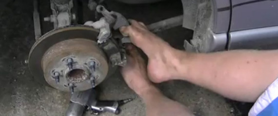 Man No Arms Changes Brakes Feet