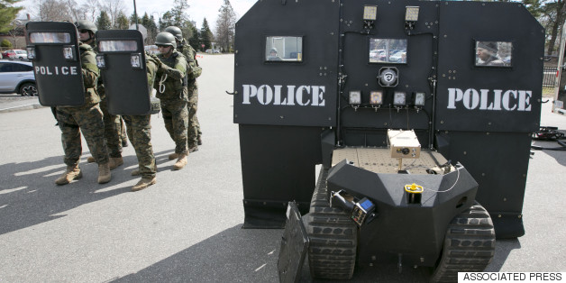 Obama Bans Some Military-Style Equipment Provided To Police