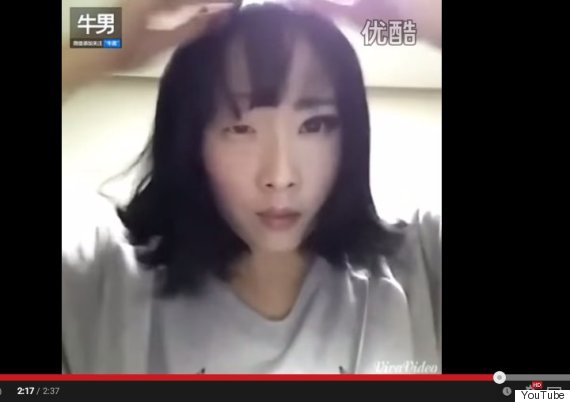 south korean woman removing makeup