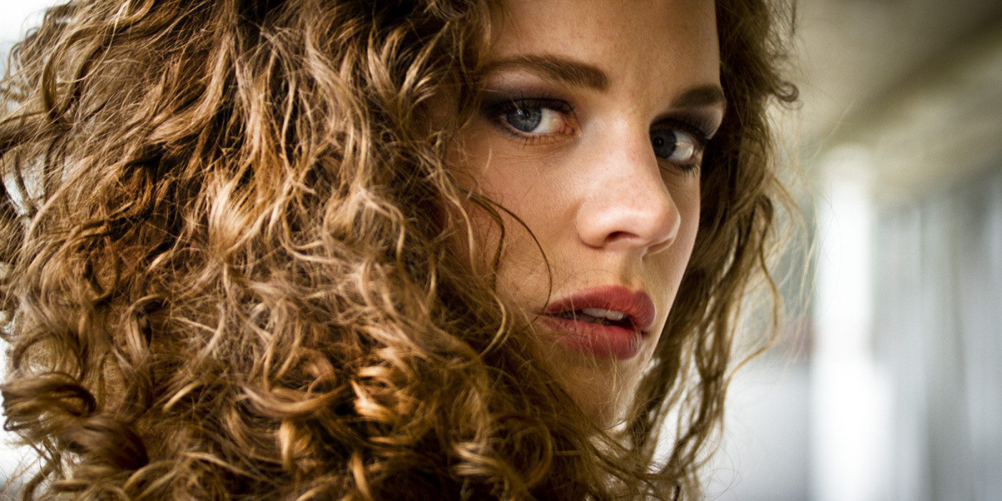 how-to-keep-curls-from-frizzing-in-the-rain-huffpost